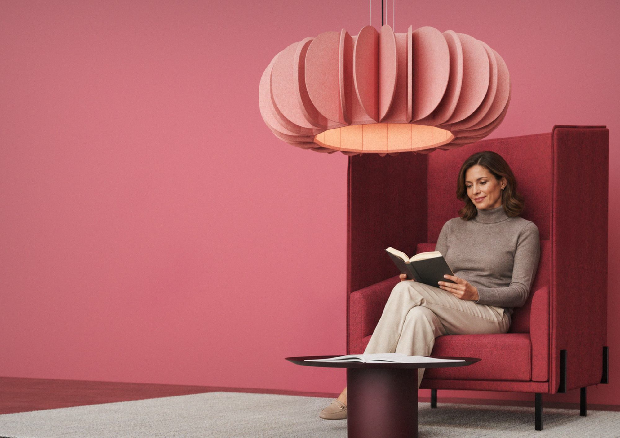 Older woman relaxing beneath acoustic lighting.